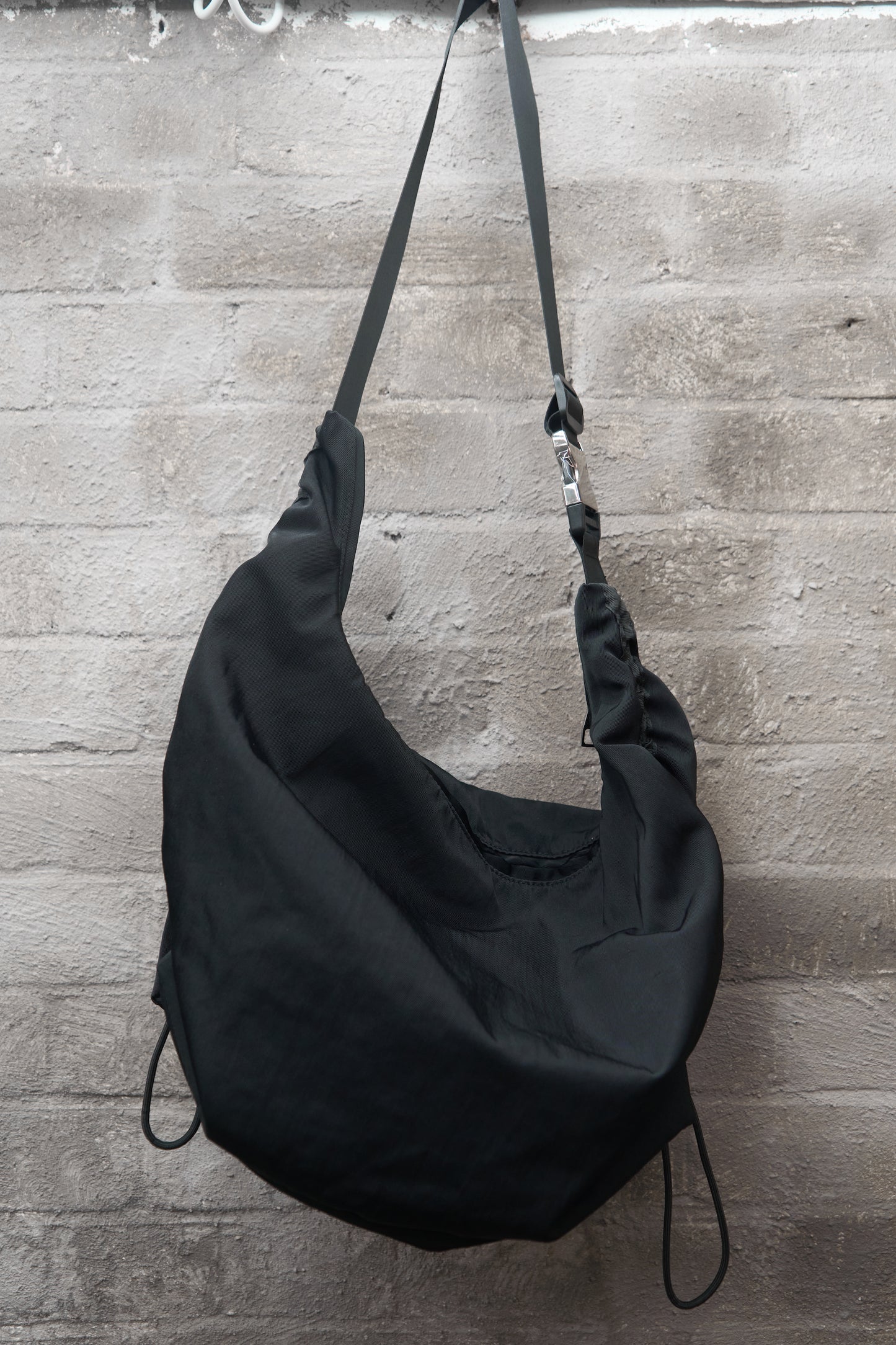 Drawstring crossbody bag