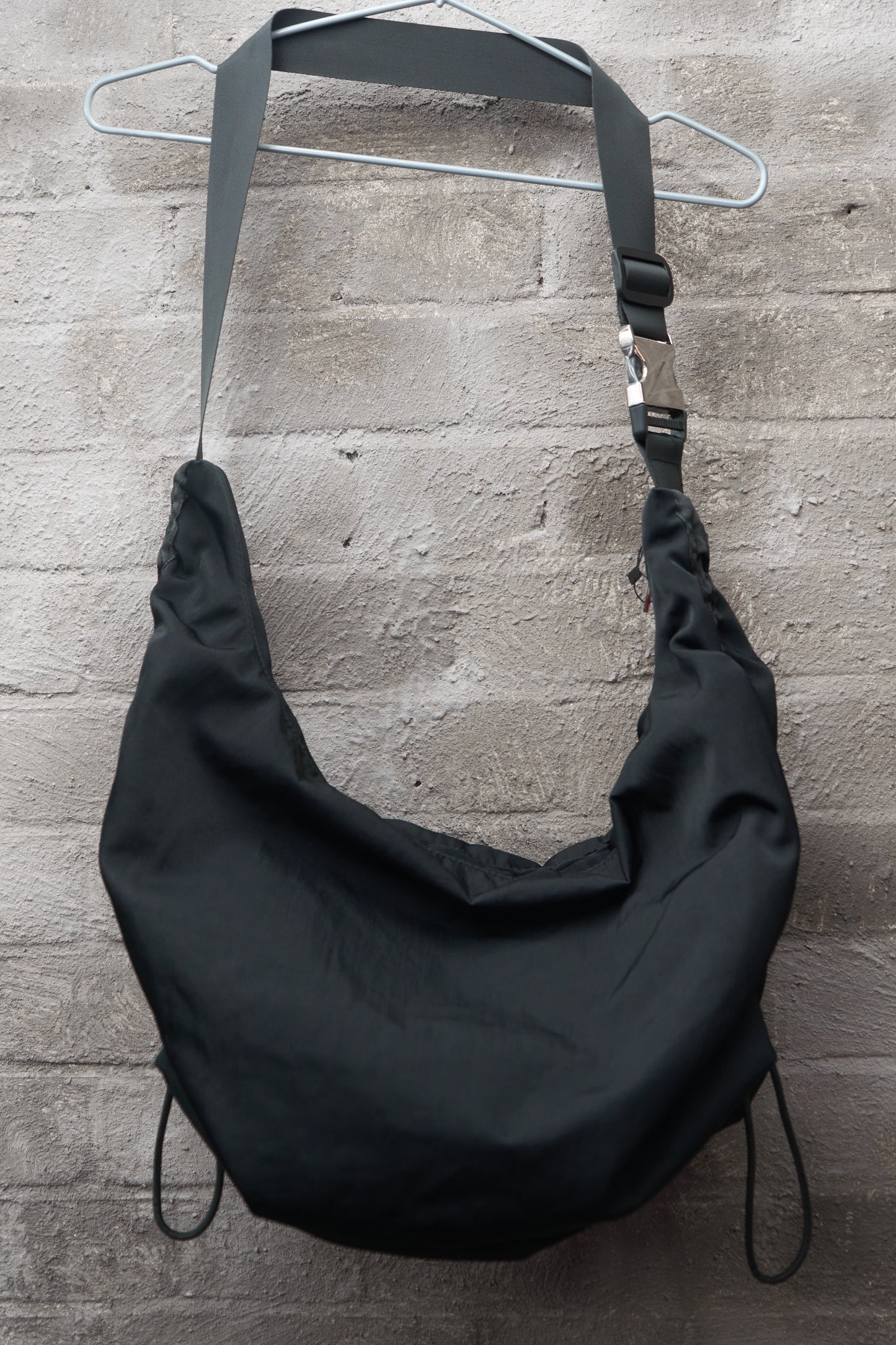Drawstring crossbody bag