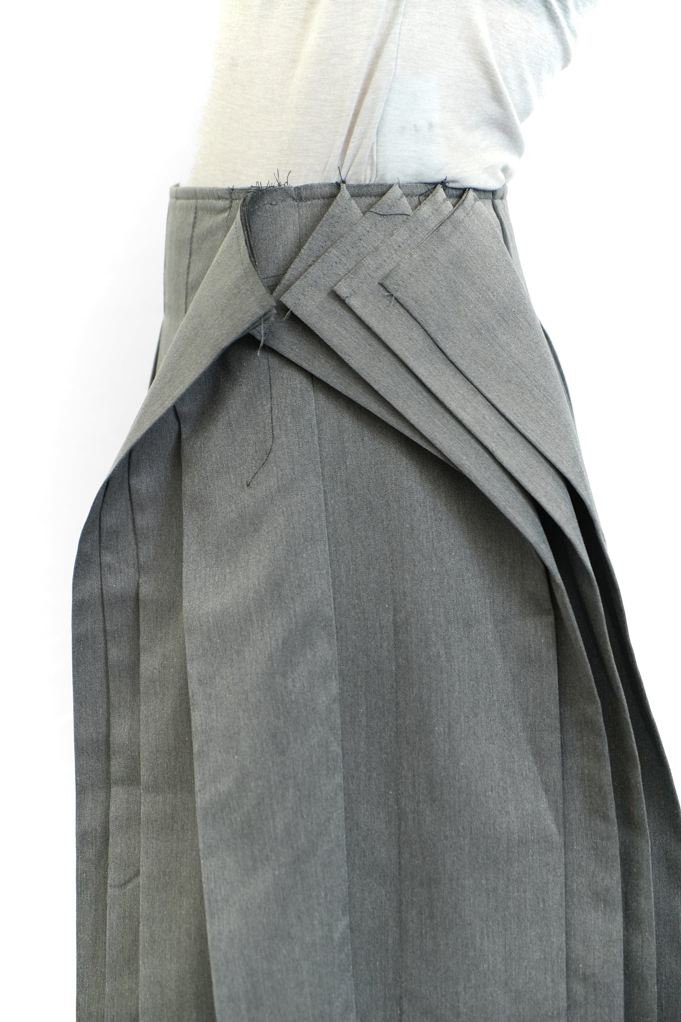 Grey asymmetric pleated skirt