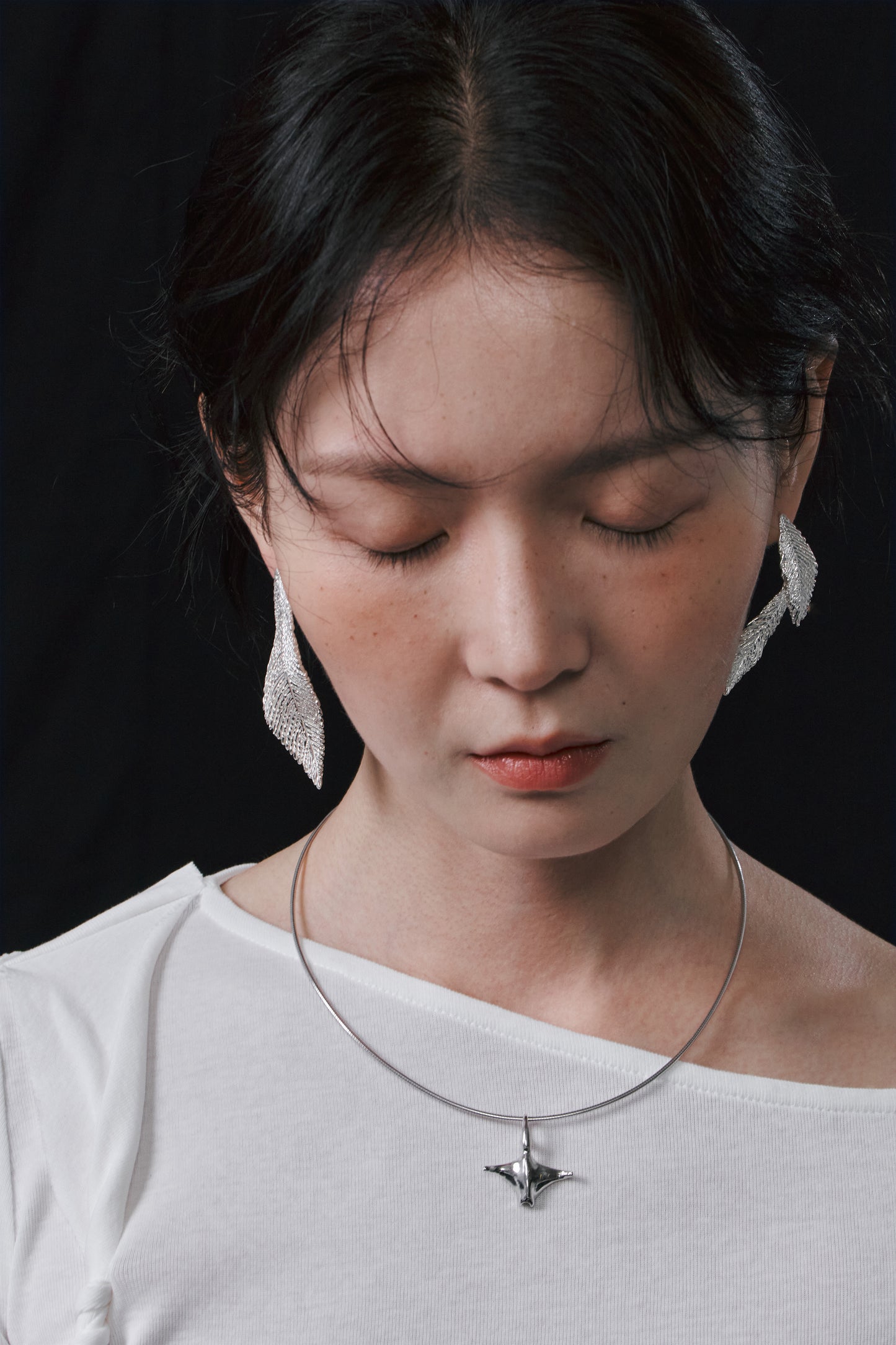 Feathers earrings (two)