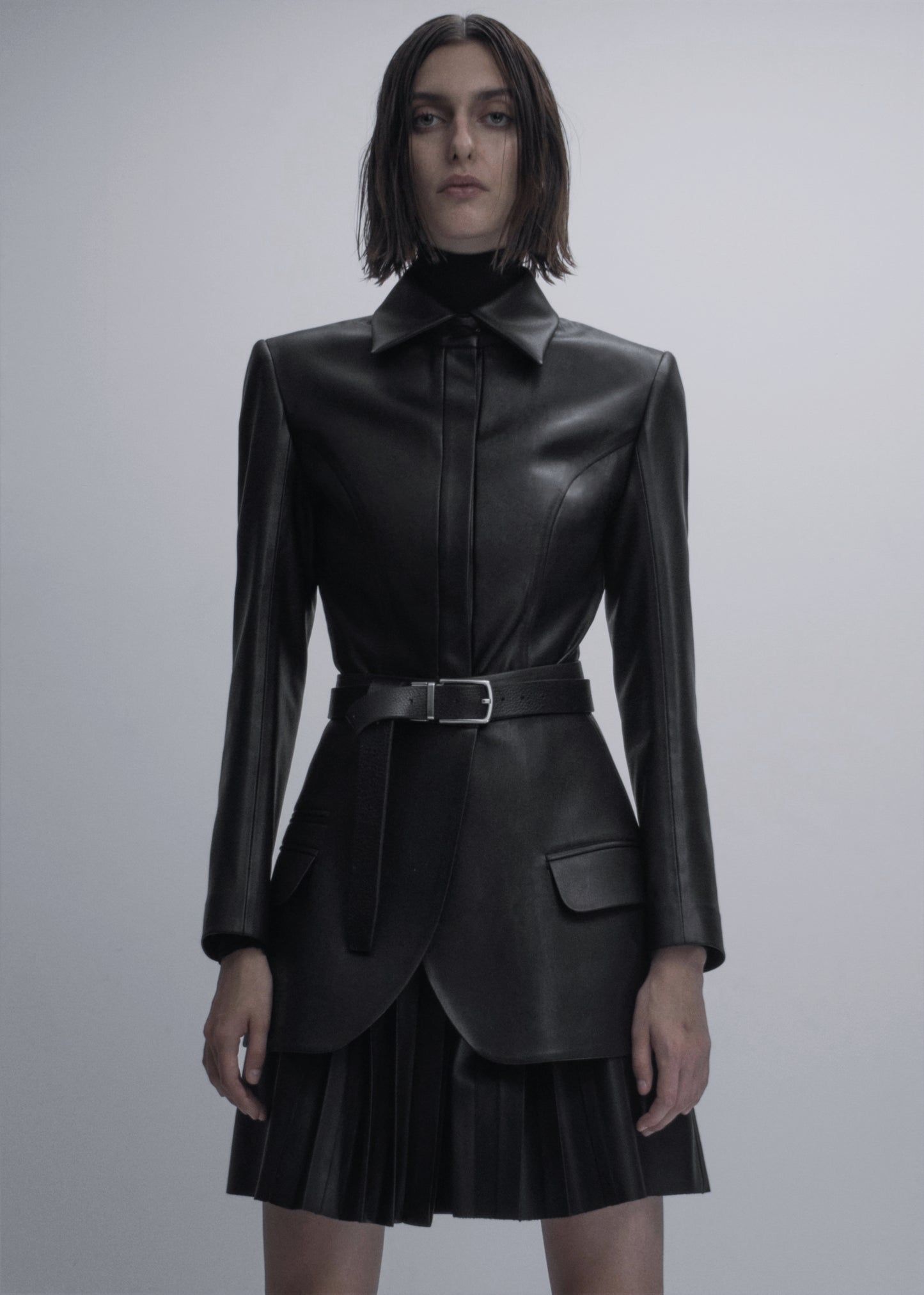 Vegan leather mini shirt dress with pleated skirt