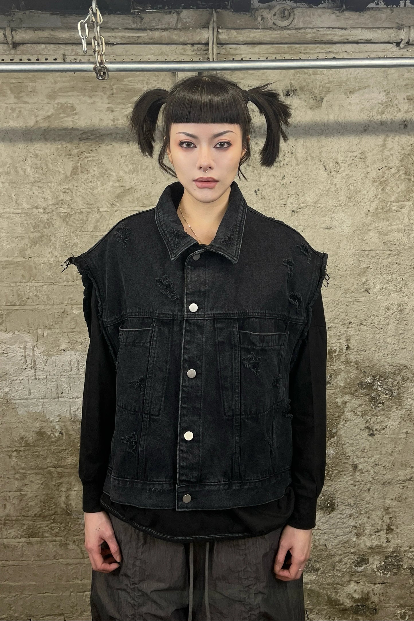 Distressed denim vest
