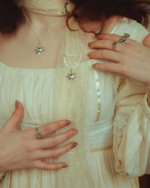 Kiki star brooch