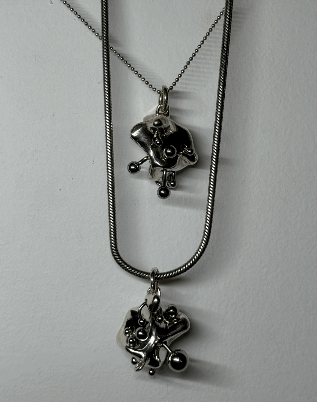 Reverse piercing ear canal (pendant only)