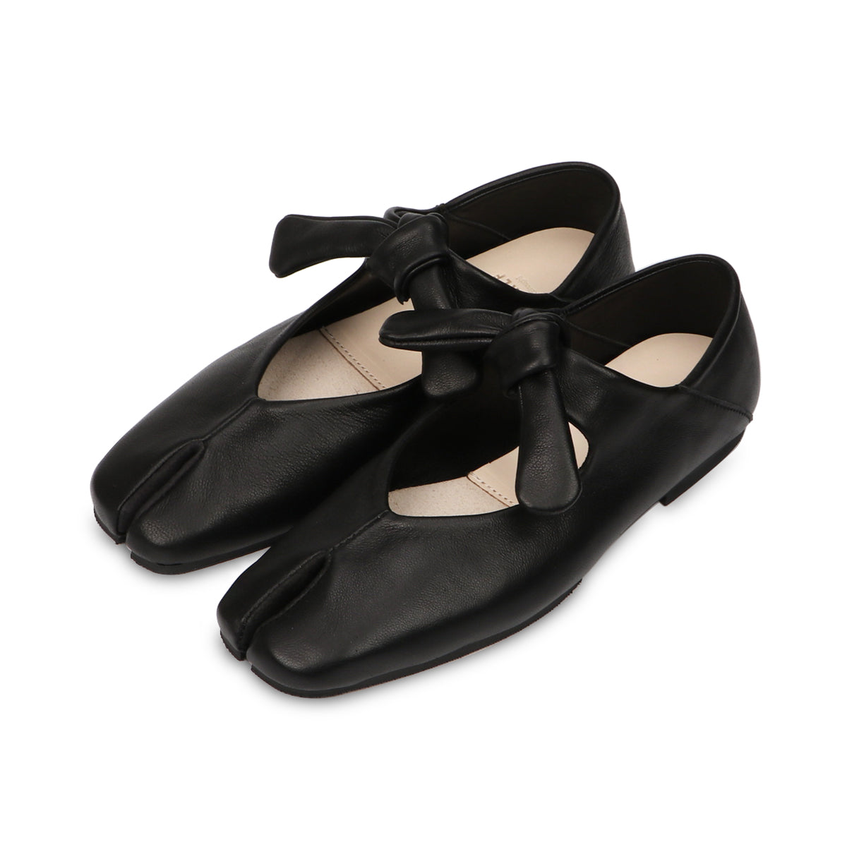 Maki lamb skin flats