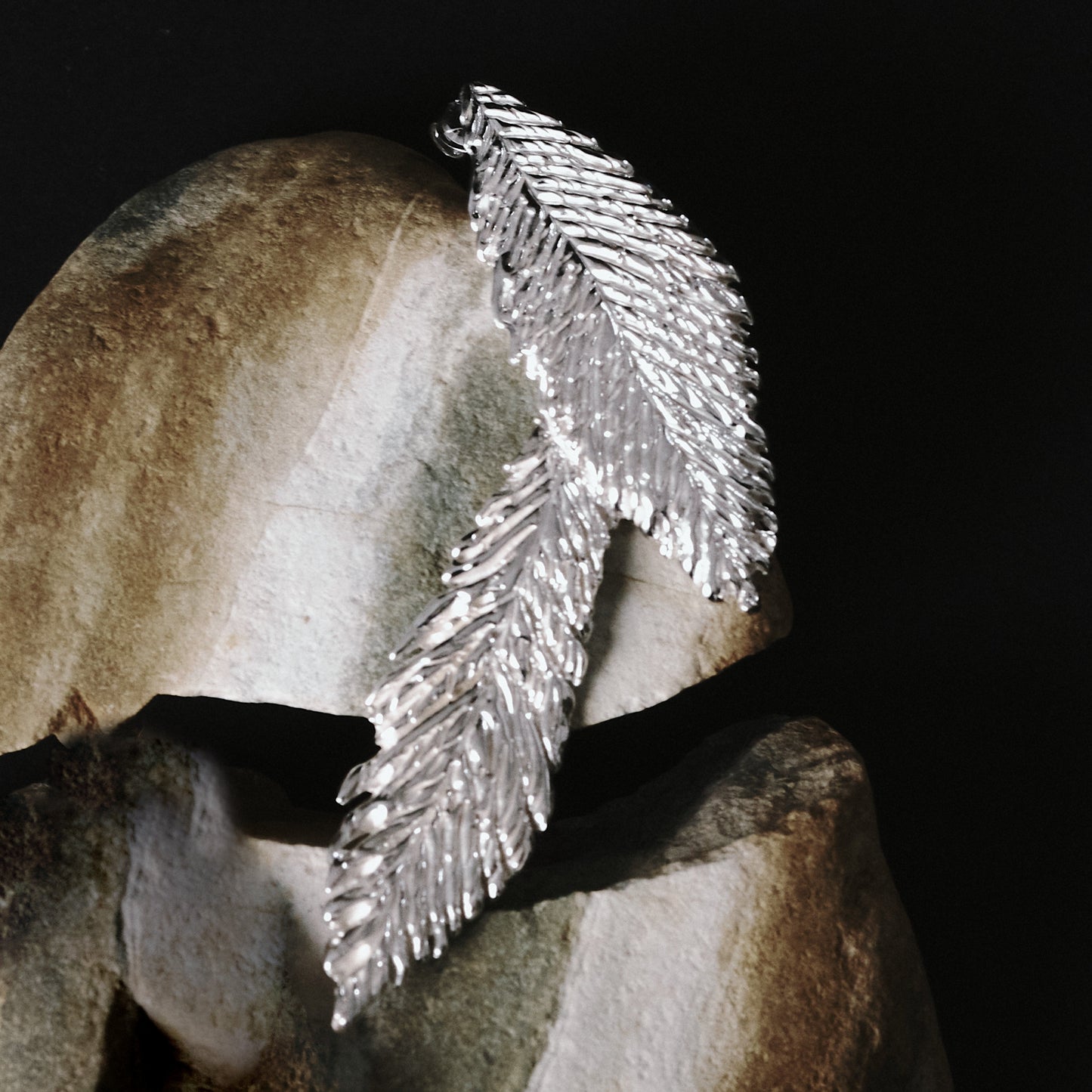 Feathers earrings (two)