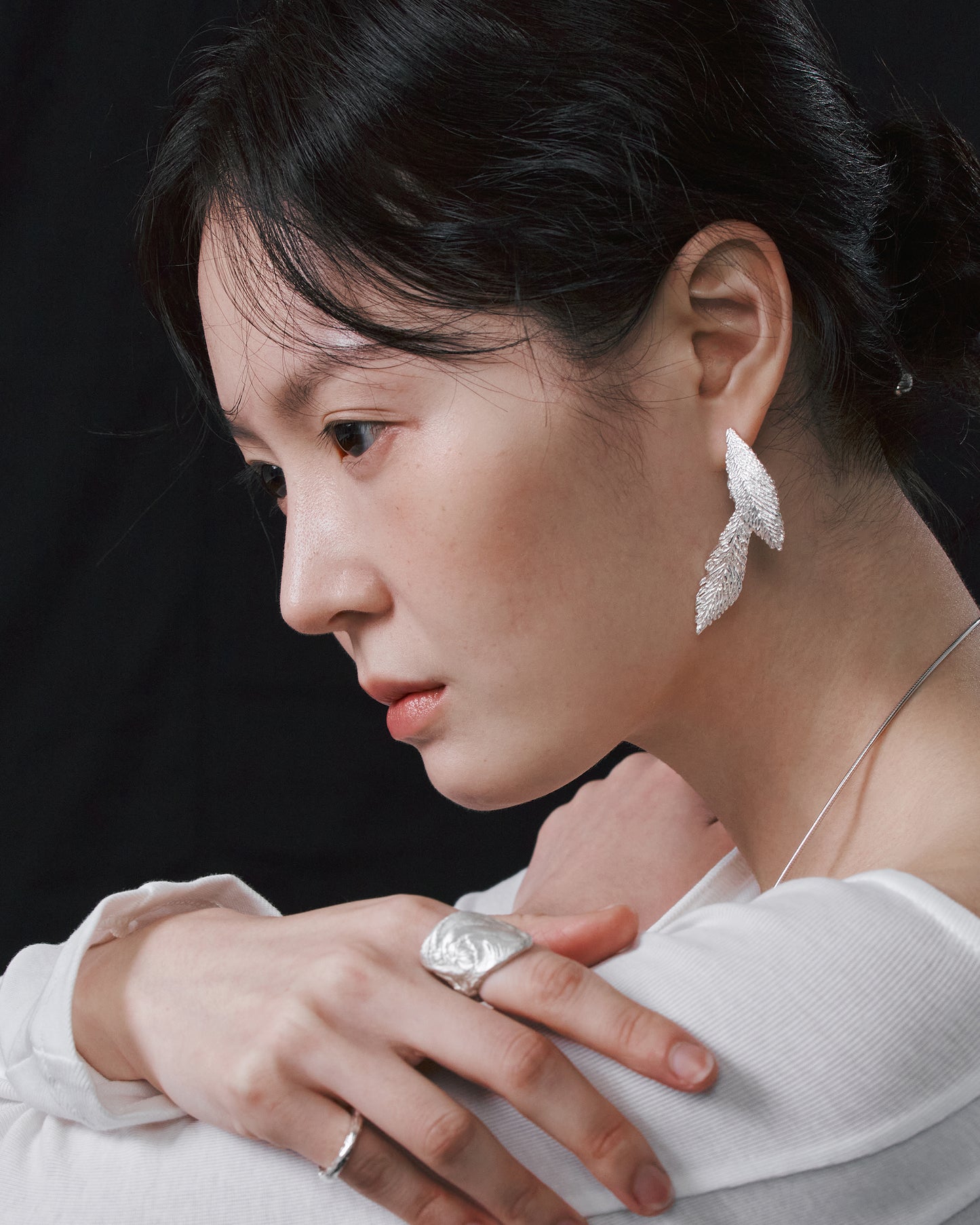 Feathers earrings (two)