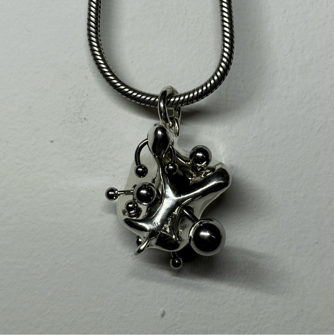 Reverse piercing ear canal (pendant only)